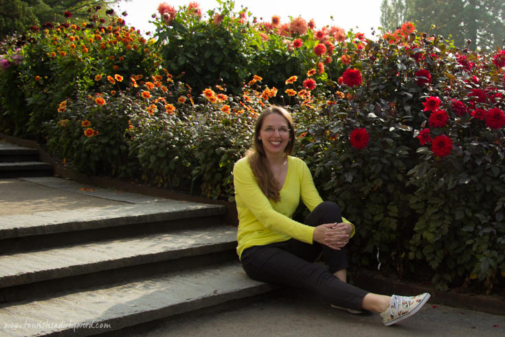 Posing by the stunning Dahlia Gardens in full bloom on Mainau Island, Germany