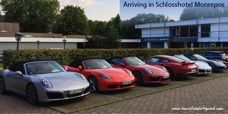 Schlosshotel Monrepos with Porsche cars lined up in front