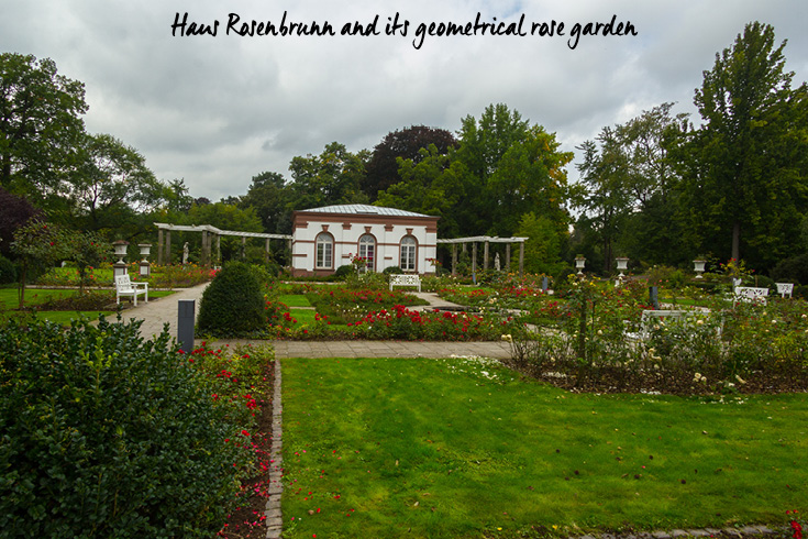 Haus Rosenbrunn and its geometrical rose garden in Palmengarten in Frankfurt am Main, Germany