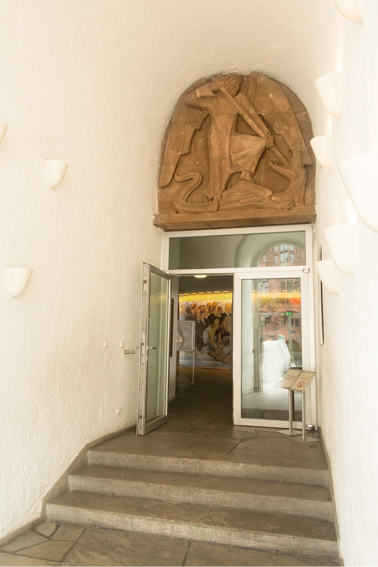 Entrance to the Paulskirche, with the mural The Path of the Representatives by Johannes Grützkeby just beyond. 