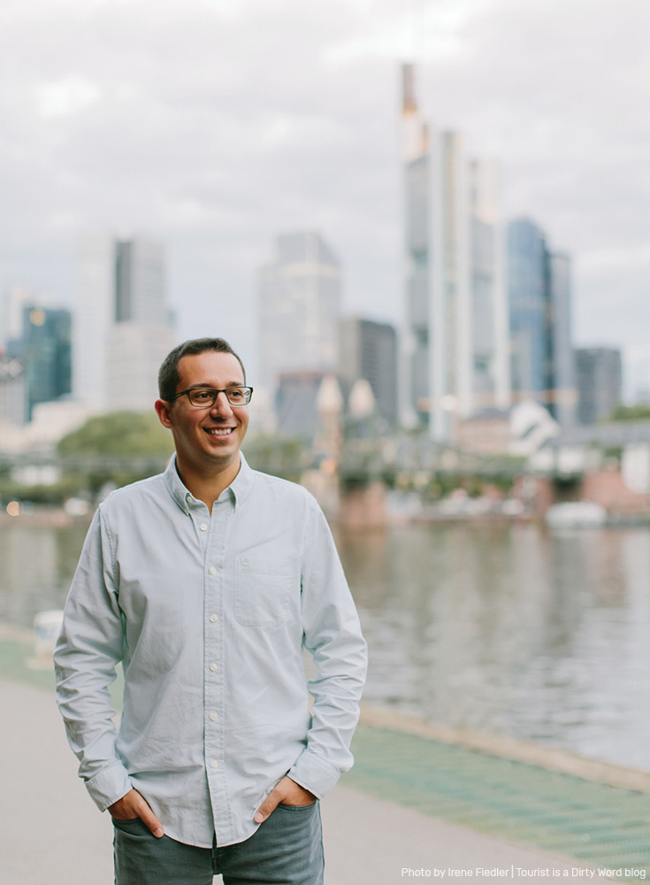 Posing with the 'Mainhattan' skyline of Frankfurt am Main blurred in the background | Photo by Irene Fiedler for Tourist is a Dirty Word Blog