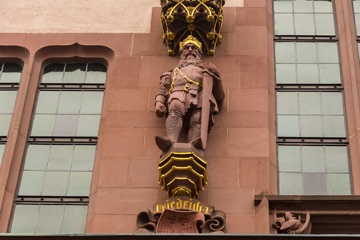 Typical for neo-gothic, or gothic revival architecture, all structural elements are decorated. Four Kings, such as Friedrich I, are on the Roemer facade in Frankfurt.